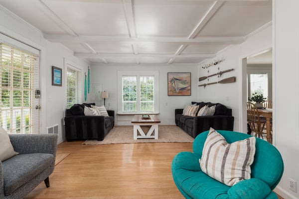 Unwind in your bright, beachy living space with coastal details and plenty of room to relax after a day of adventure.