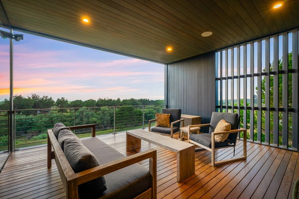 Unwind on this beautiful covered terrace with comfortable seating and warm lighting. Watch the sky paint itself in soft hues while enjoying sweeping views of the surrounding landscape—perfect for morning coffee or evening relaxation.