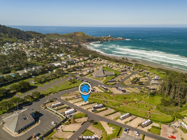 Coastal vacation property located near pristine beach, natural headlands, and scenic ocean views, with nearby facilities and community access.