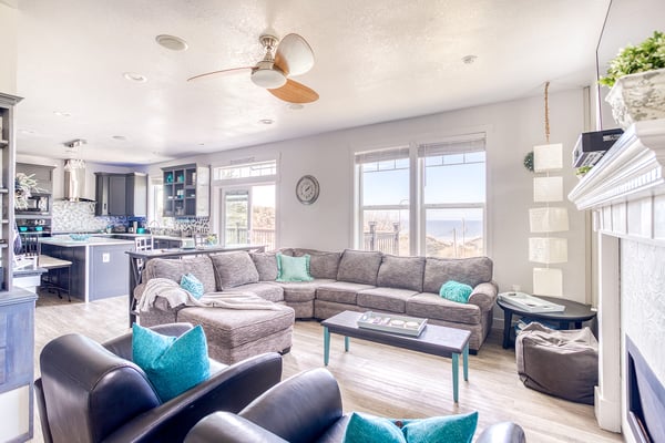 Sink into plush sectional seating while mountain views fill your windows in this open living space.