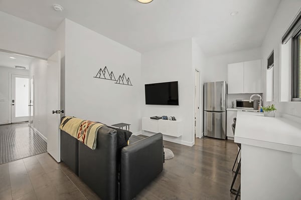 Unwind in your sleek, open-concept space with modern comforts and mountain-inspired touches perfectly designed for your getaway.