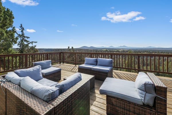 Soak in sweeping mountain vistas from your private deck, complete with plush seating perfect for morning coffee or sunset unwinding.