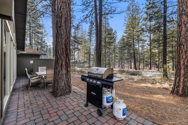 Fire up the grill on your private patio surrounded by towering pines for the perfect mountain retreat experience.