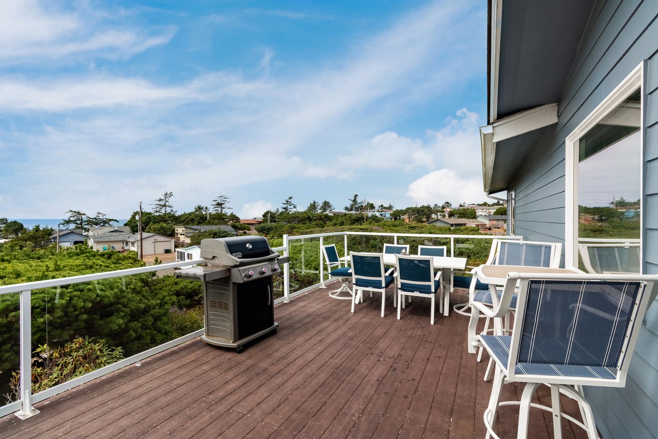 Picture yourself grilling up fresh seafood on your private deck, then settling into your choice of sunny seats to savor ocean breezes and a lush coastal horizon stretching toward the water.