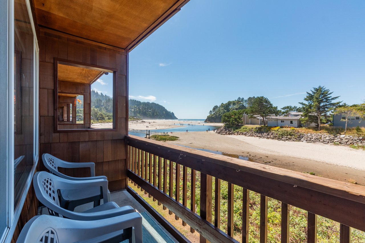 Nestled beside a beautiful sandy beach with gentle waves and lush coastal greenery, this peaceful beachfront property offers easy water access and stunning natural surroundings.
