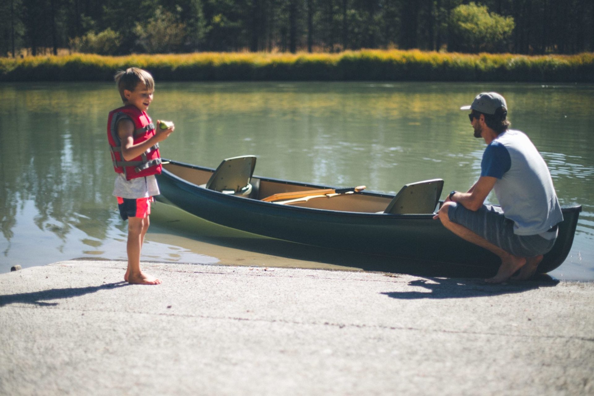 Child and father with kayak in Central Oregon