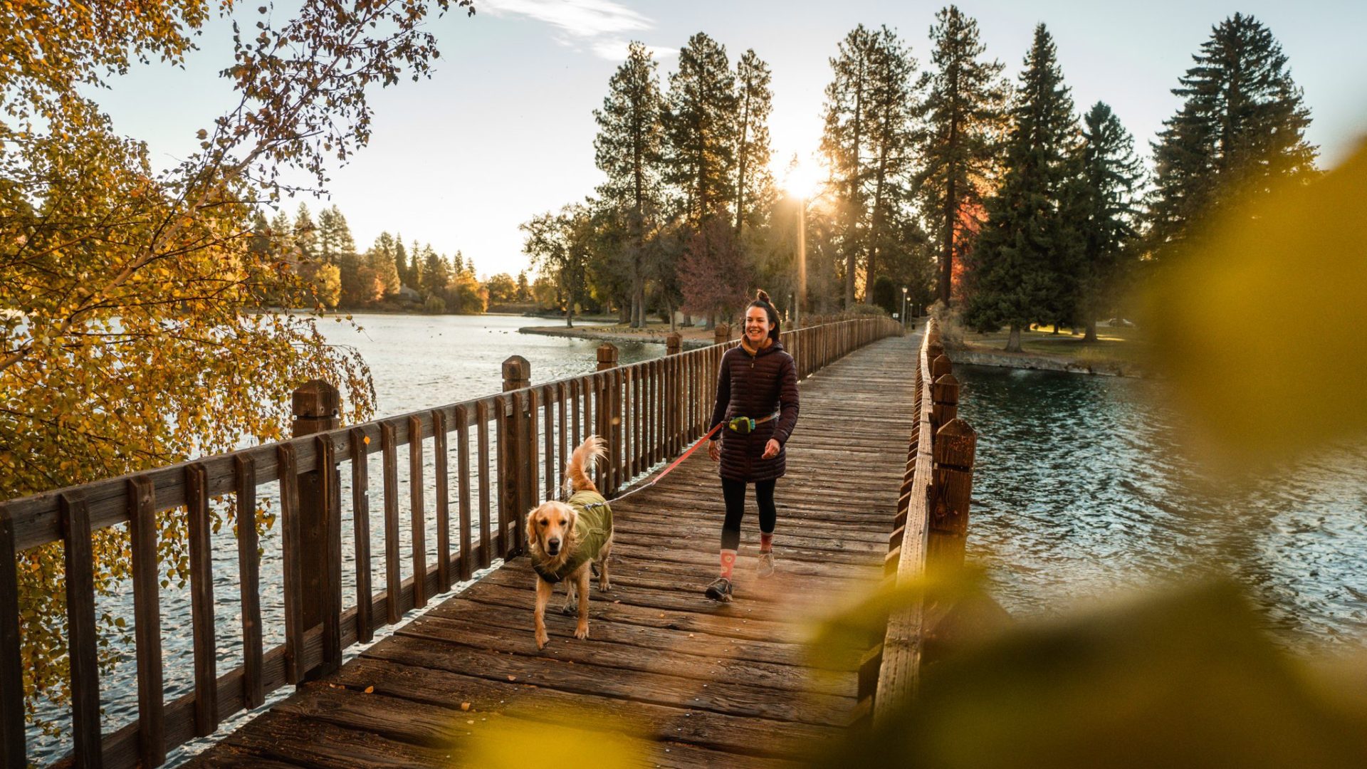 Drake Park Woman on Bridge with Dog